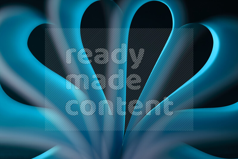 فن تجريدي يعرض منحنيات وتدرجات اللون الأزرق مكونه بضوء ملون