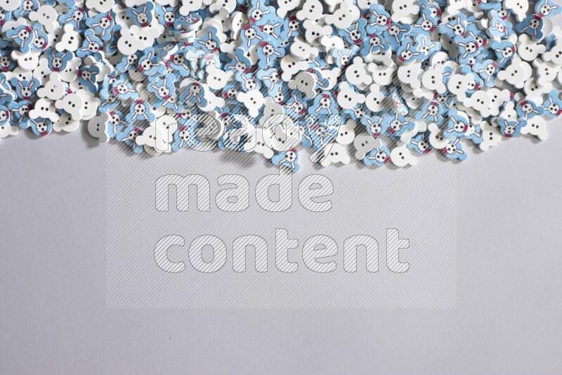 Multicolored buttons placed on grey background