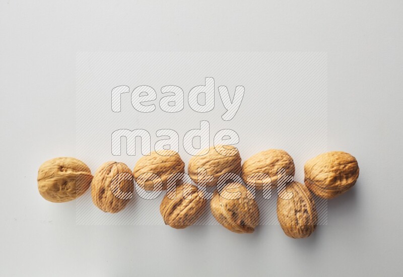 Top-view shot of walnut on white background