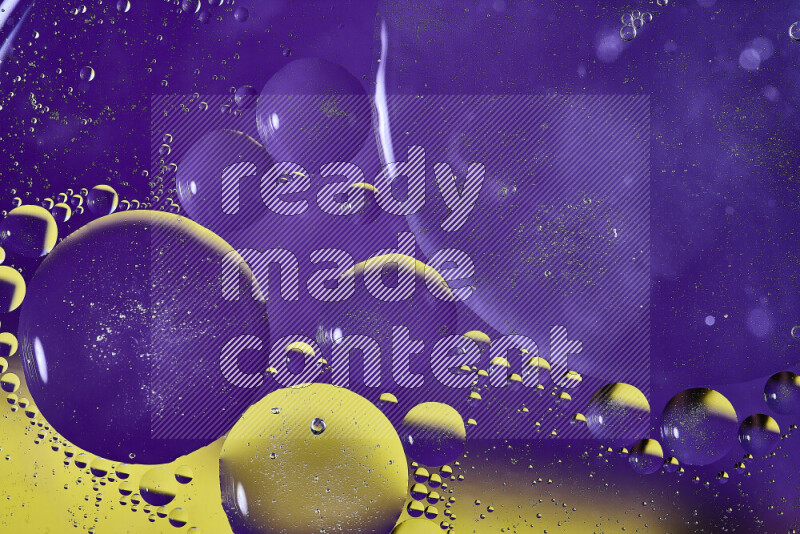 Close-ups of abstract oil bubbles on water surface in shades of purple and yellow