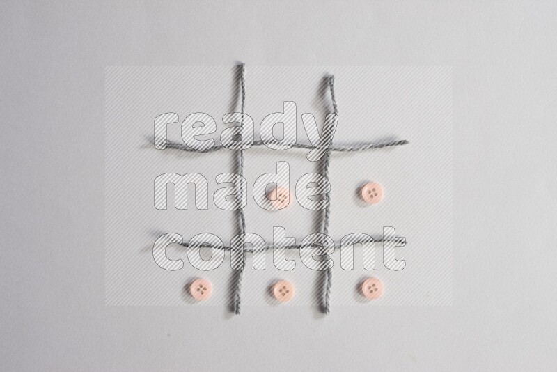 Rose buttons placed on grey background