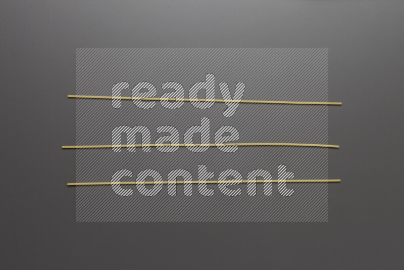 Spaghetti pasta on grey background
