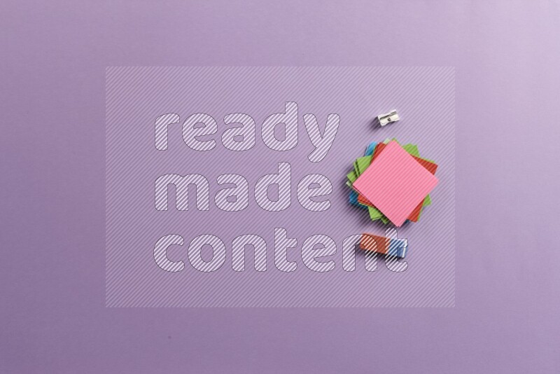 Multicolored sticky notes with school supplies on purple background