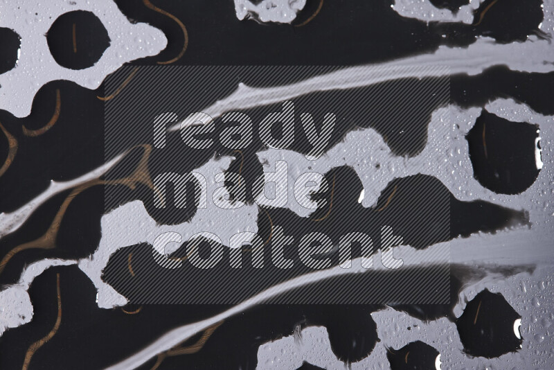 Close-ups of abstract black paint texture in different shapes