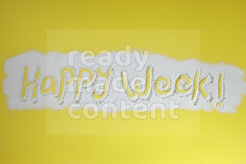 A sentence written with powder on yellow background