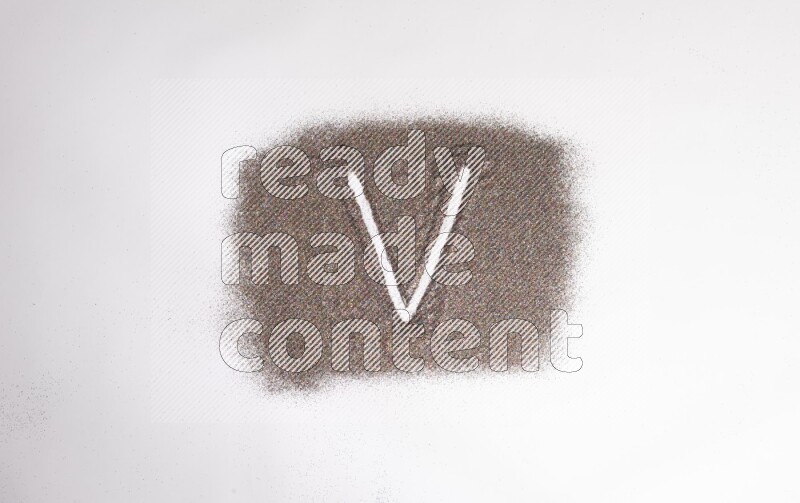 Alphabets written with glitter on white background