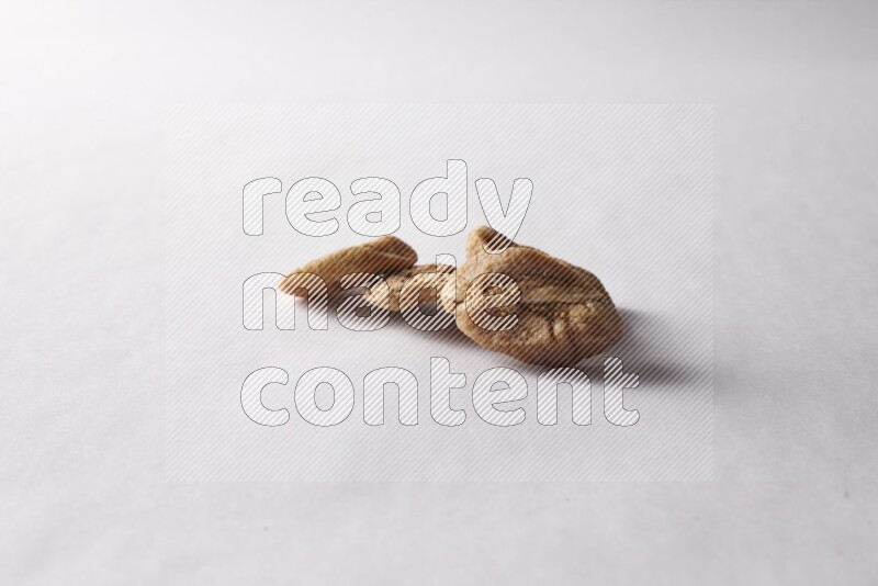 Dried figs on white background