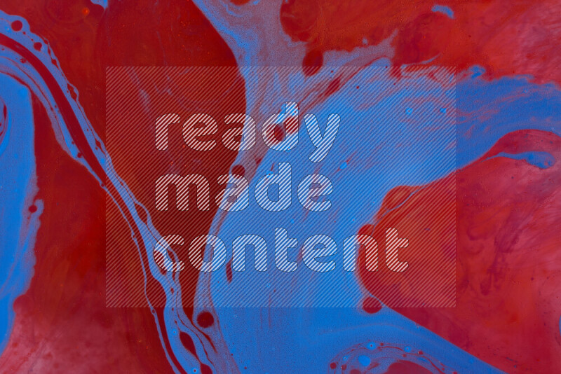 The image depicts a marbling effect with swirling patterns of red and blue