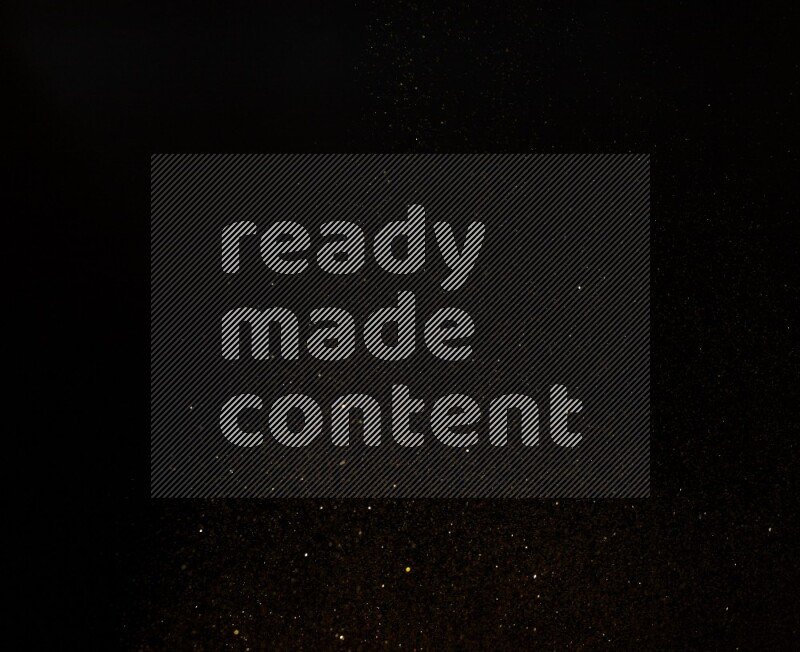 Gold glitter powder isolated on black background