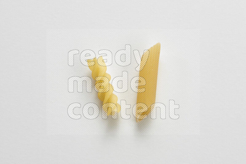 Different pasta types on white background