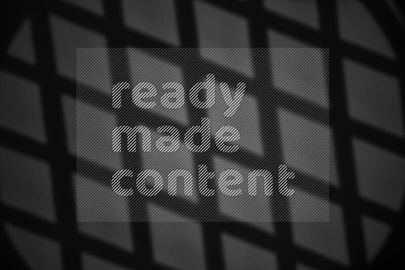 مجموعة من ضوء الغوبو الخافت تظهر أنماط هندسية علي سطح ناعم