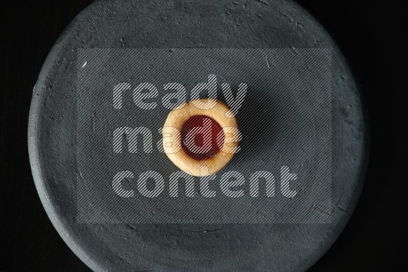 Jam cookies on a black background