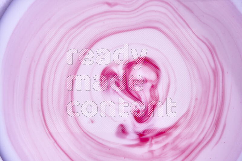 لقطة مقربة لأنماط دوامية باللون الأحمر والأبيض