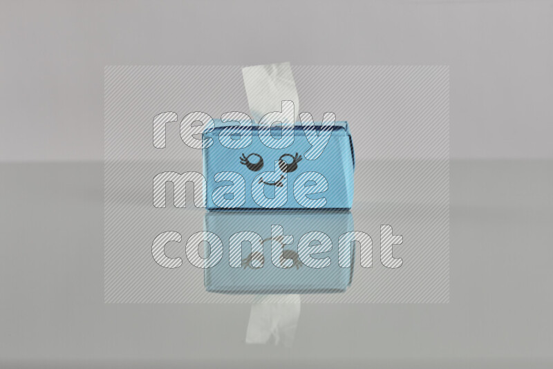 Origami tissue box on grey background