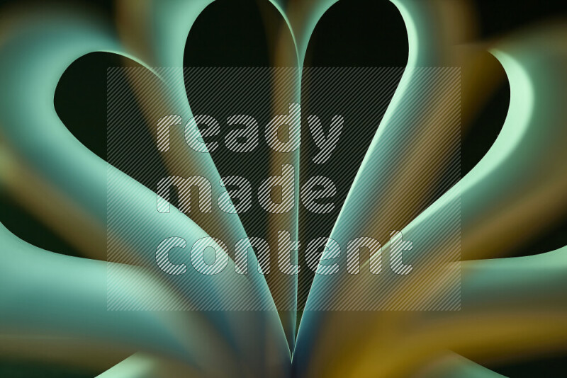 فن تجريدي يعرض منحنيات وتدرجات اللون الأصفر والأخضر مكونه بضوء ملون