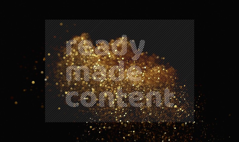 Gold glitter powder isolated on black background