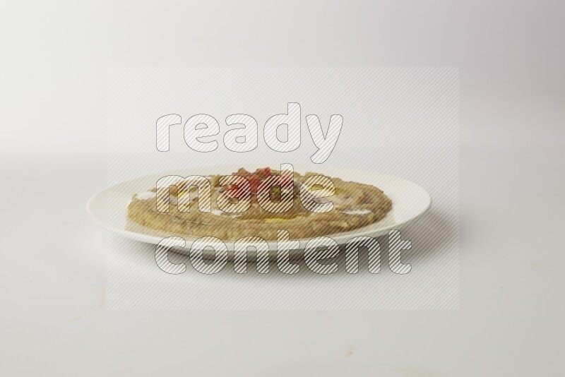fava bean in a white plate direct on a white background