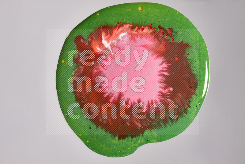 Close-ups of assorted colors blending on a grey background