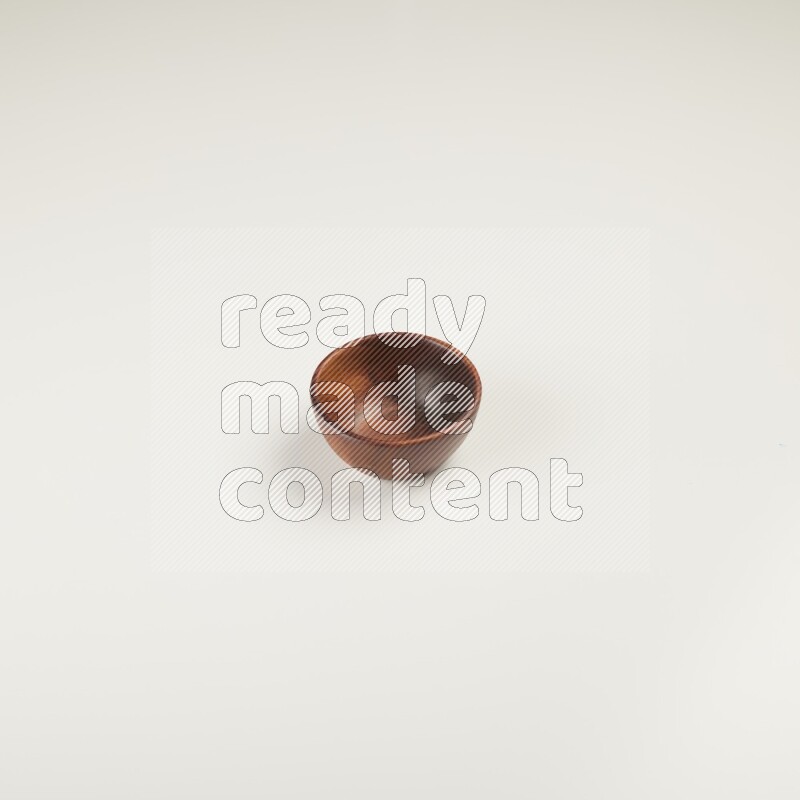 Wooden bowl on white background