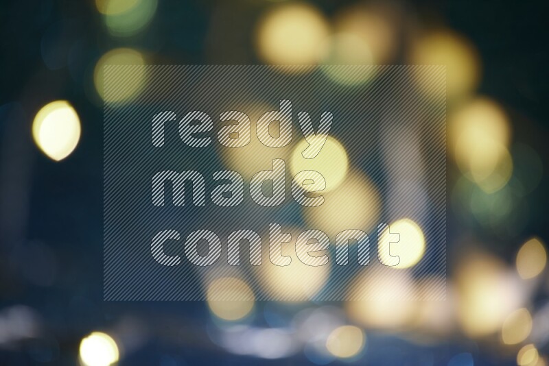 Bokeh light in yellow with blue background