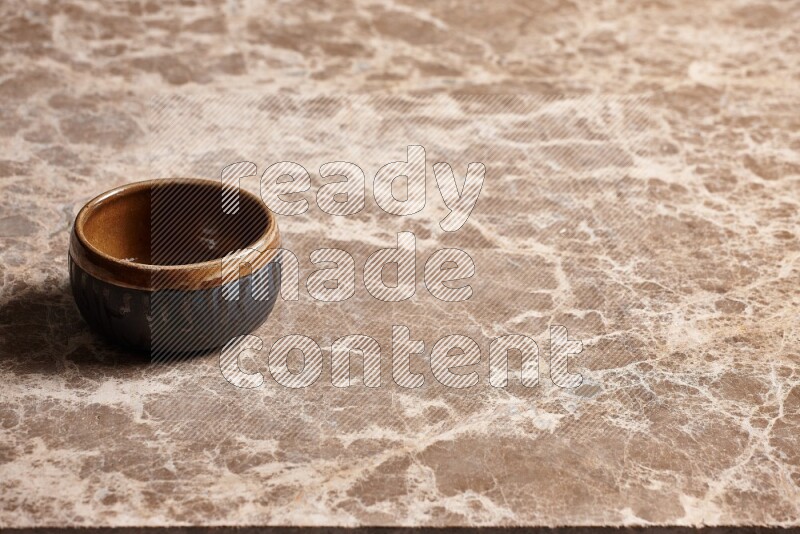 Multicolored Pottery Bowl on Beige Marble Flooring