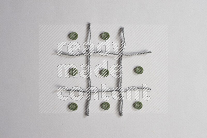 Green buttons placed on grey background