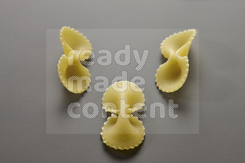 Fiocchi pasta on grey background