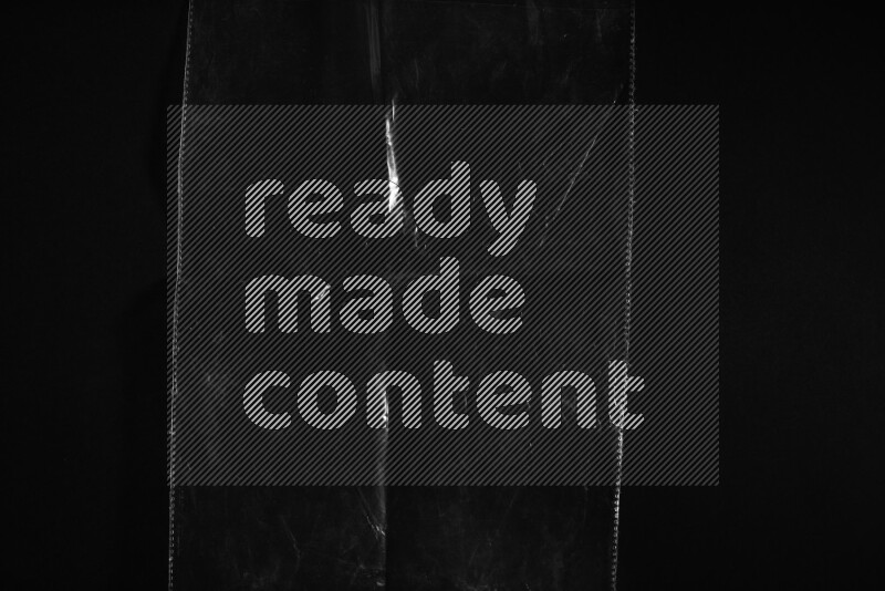 Transparent plastic textures on black background