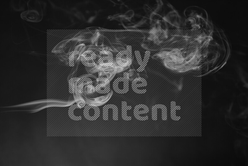 Motion of wavy smoke isolated on dark background