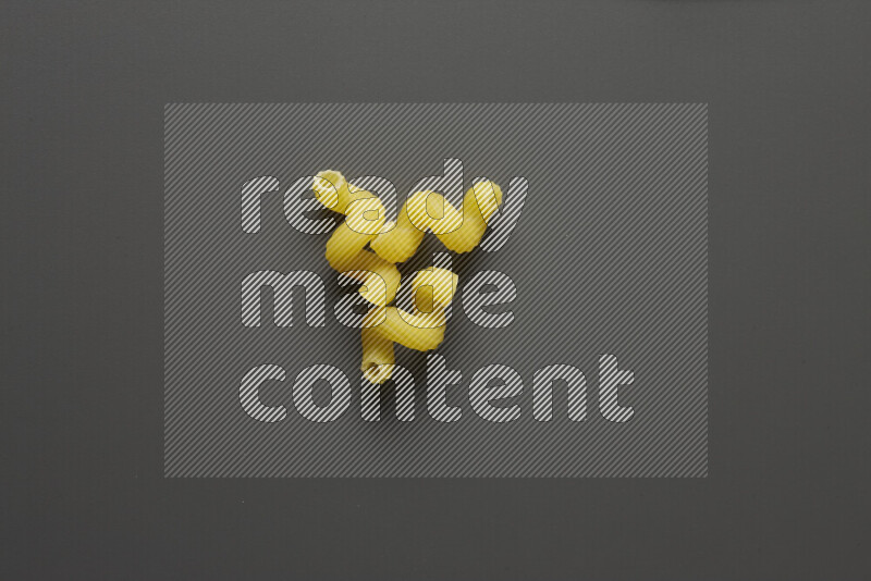 Twist pasta on grey background