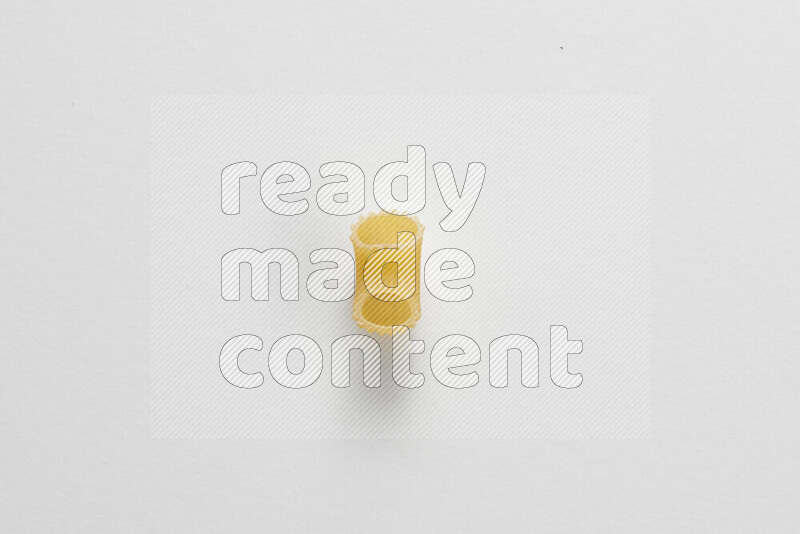 Elbow pasta on white background