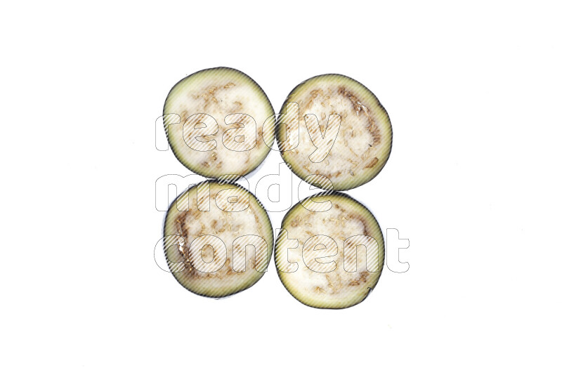 Eggplant slices on illuminated white background