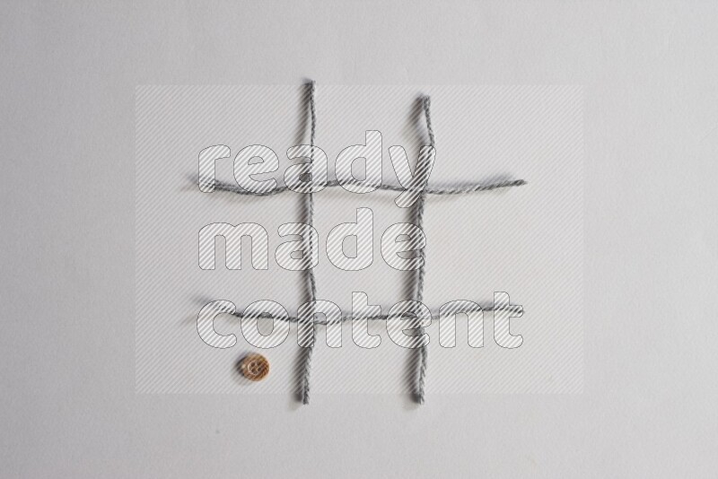 Brown buttons placed on grey background