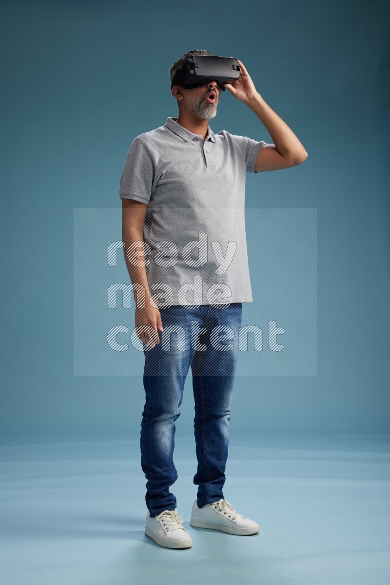 Man Standing Gaming with VR