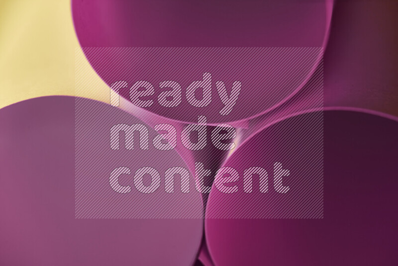 The image shows an abstract paper art with circular shapes in varying shades of pink and warm tones