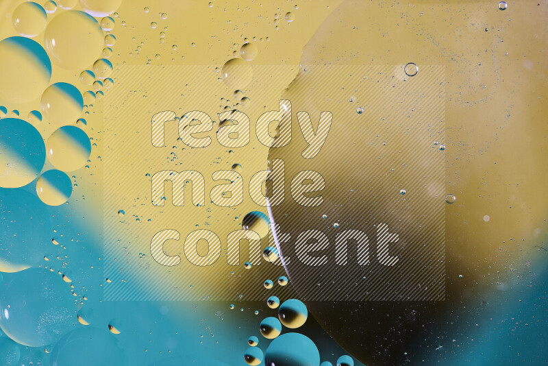 Close-ups of abstract oil bubbles on water surface in shades of blue and yellow