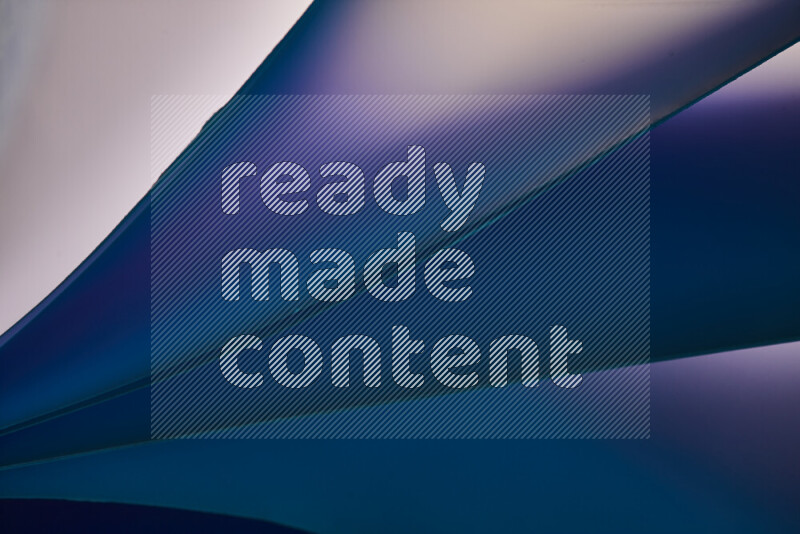 An abstract art piece displaying smooth curves in cold gradients created by colored light