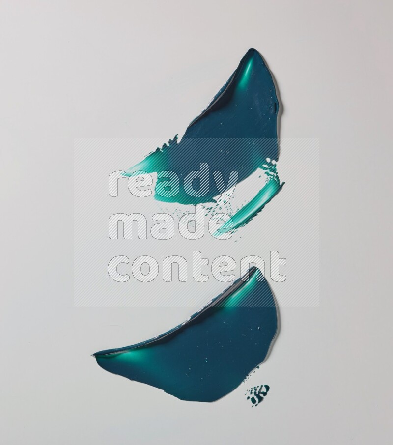 Turquoise curved painting knife strokes on white background
