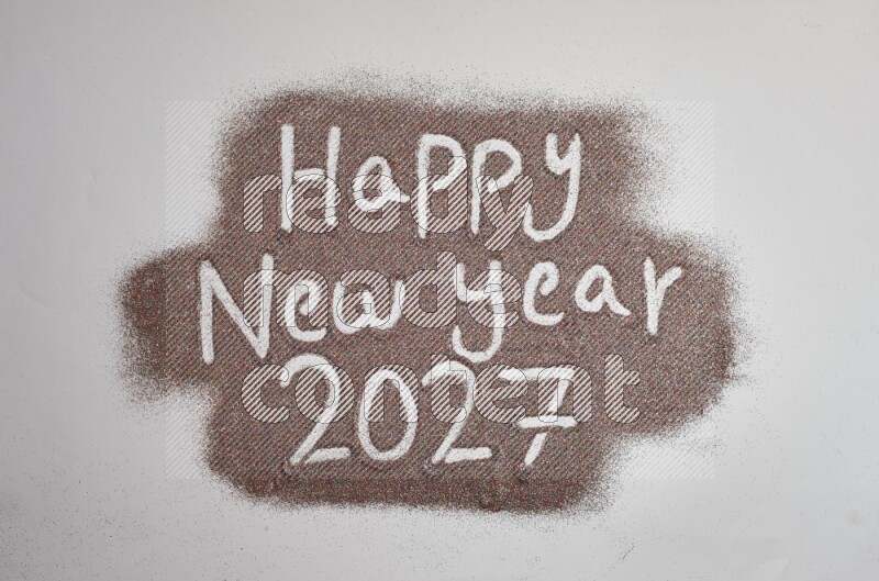 A sentence written with glitter on grey background