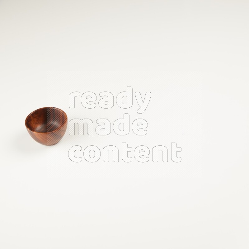 Wooden bowl on white background