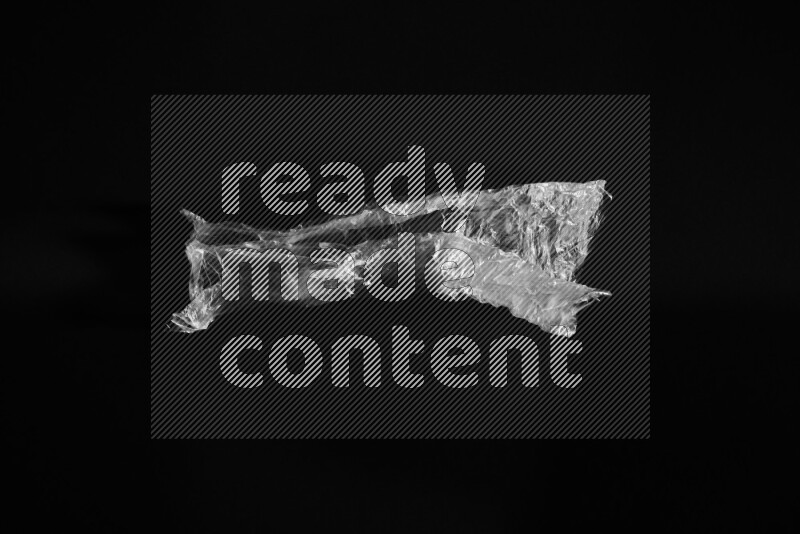 Transparent plastic textures on black background