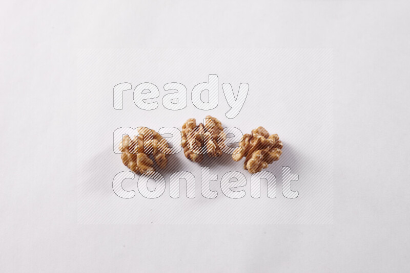 Walnuts on white background