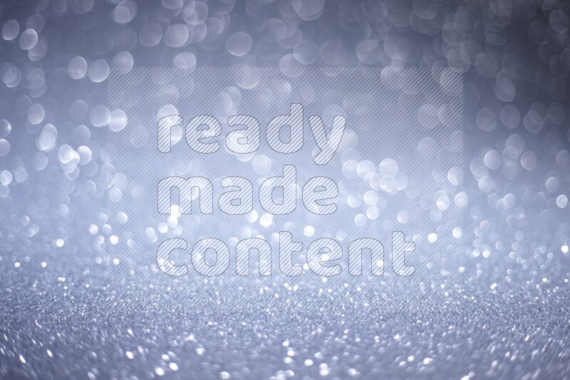 Silver glittery bokeh background