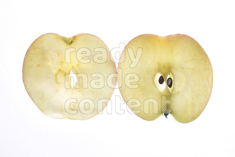Apple slices on illuminated white background