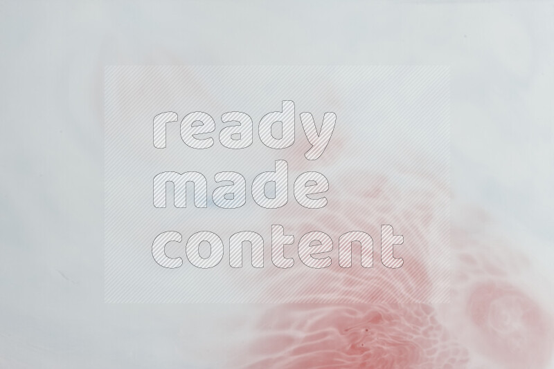 A close-up of abstract swirling patterns in red and white