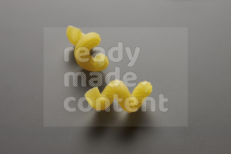 Twist pasta on grey background