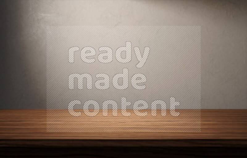 A wooden table top with colored textured wall background