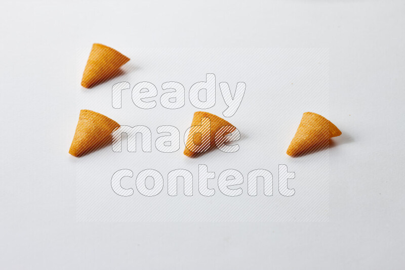 Assorted snacks on white background
