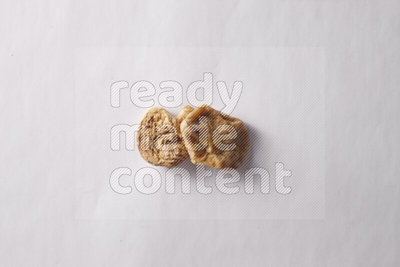 Dried figs on white background
