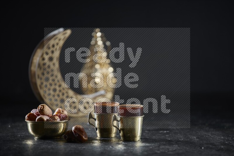 Dates with hot drinks and golden lanterns in a dark setup